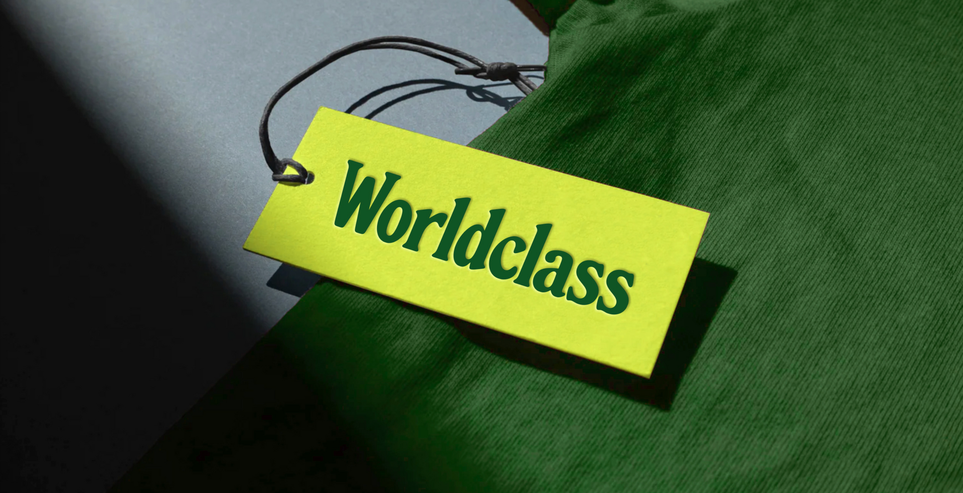 a yellow tag that says worldclass on it
