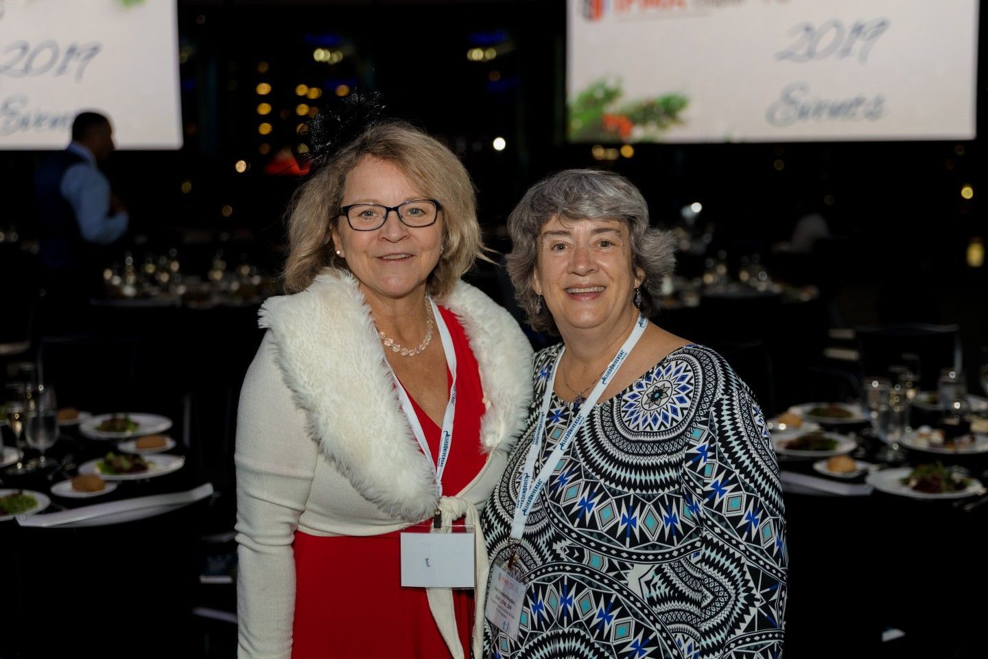 Two women at a formal event