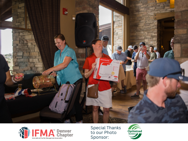 People at a fundraising event, holding raffle tickets, and drawing winners.