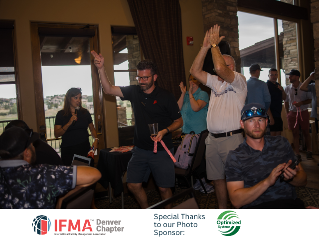 People celebrating indoors, clapping and dancing. IFMA Denver Chapter logo visible.