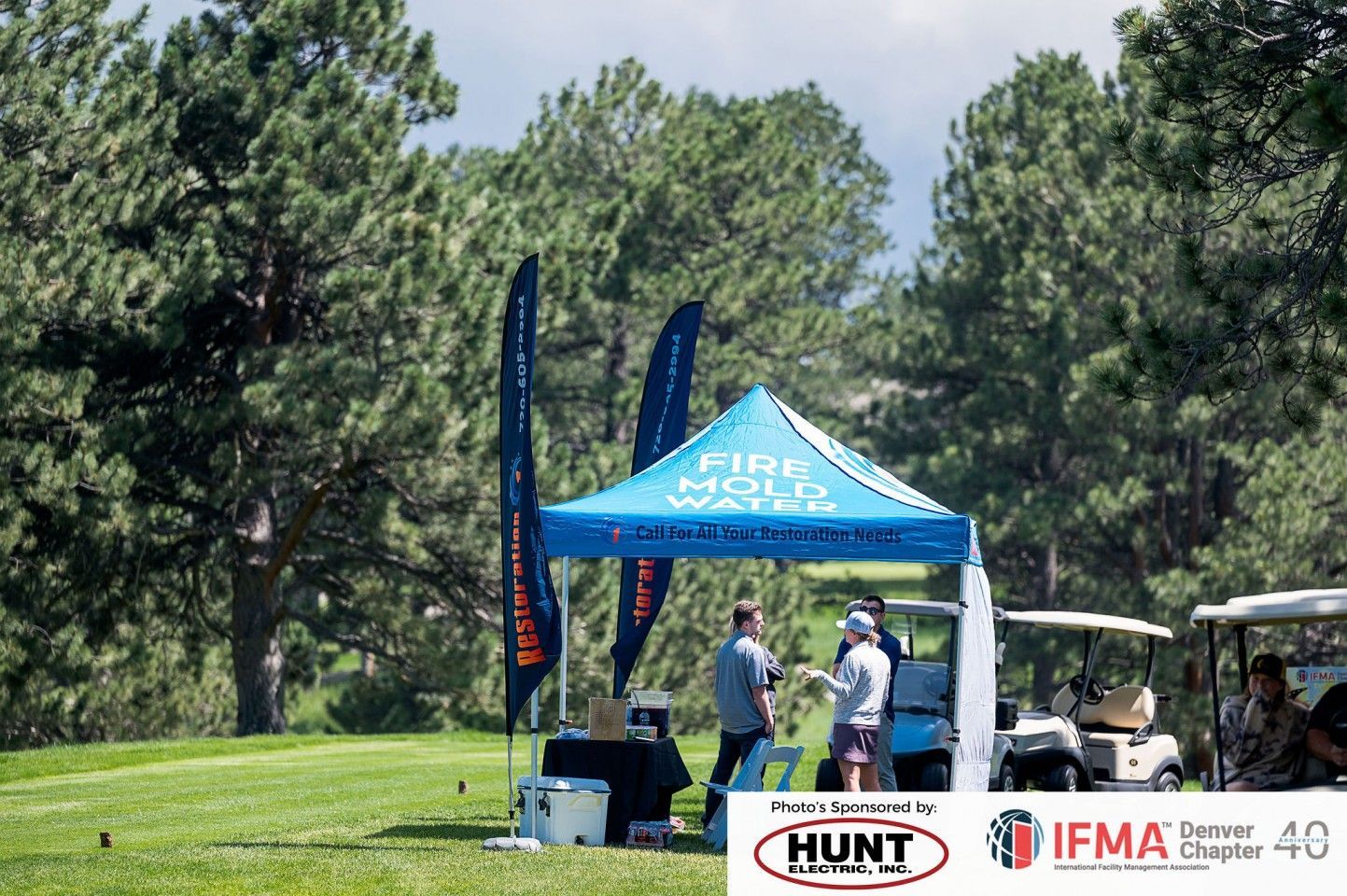 Golf outing with blue tent for 