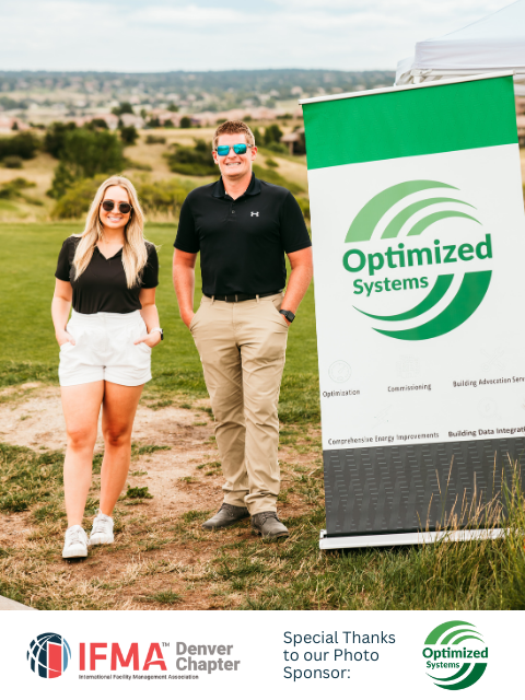 Two people stand next to an