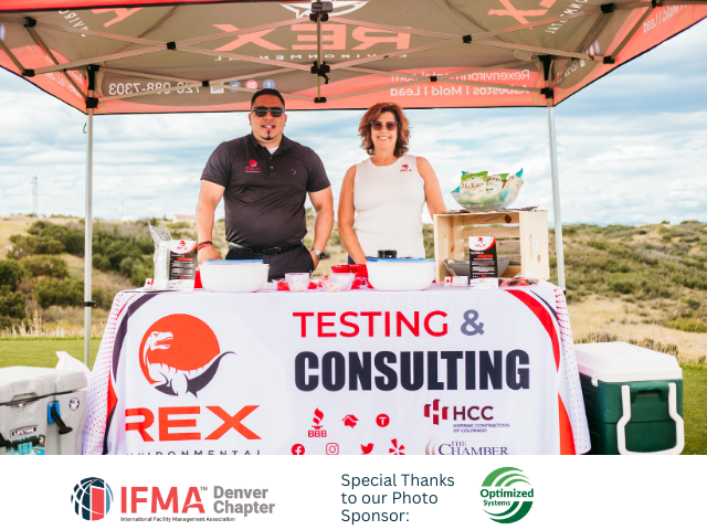 Two people at a REX Environmental booth with Testing & Consulting banner. Outdoors with a cloudy sky.