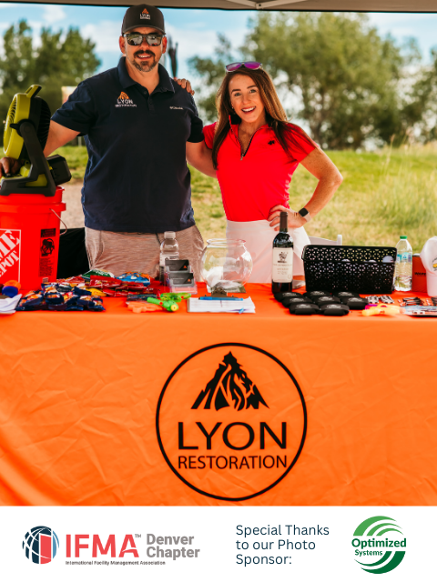Man and woman at a booth with
