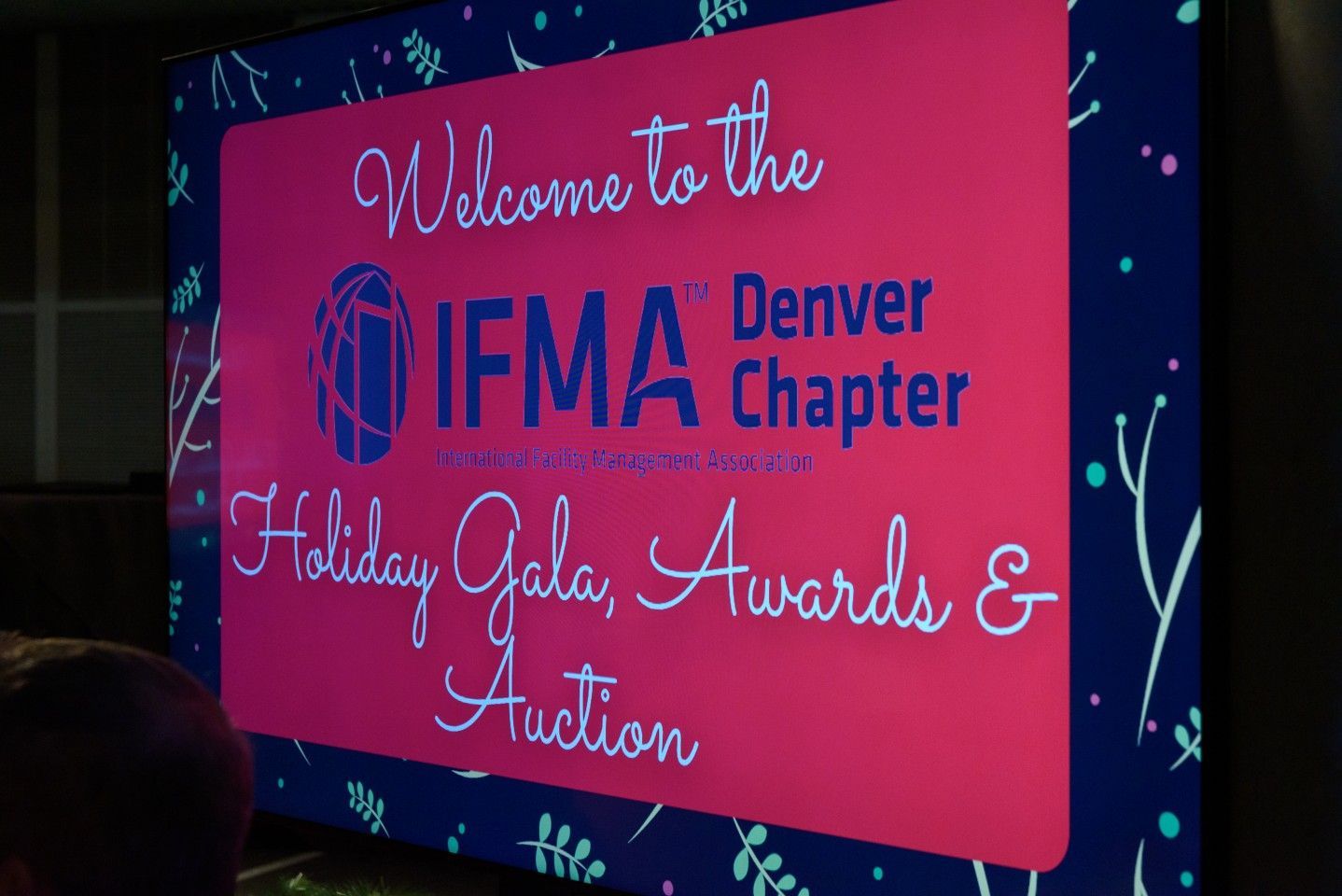 Sign at an IFMA Denver Chapter event, welcoming attendees to the Holiday Gala, Awards & Auction.