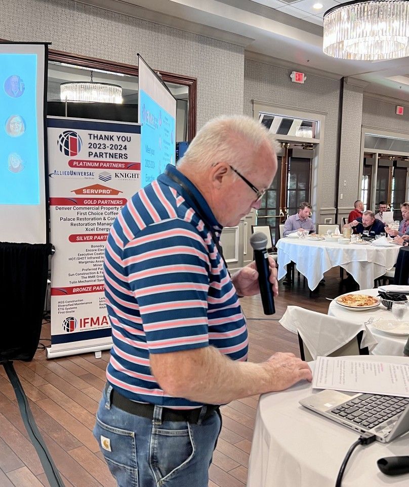 Man speaking into a microphone