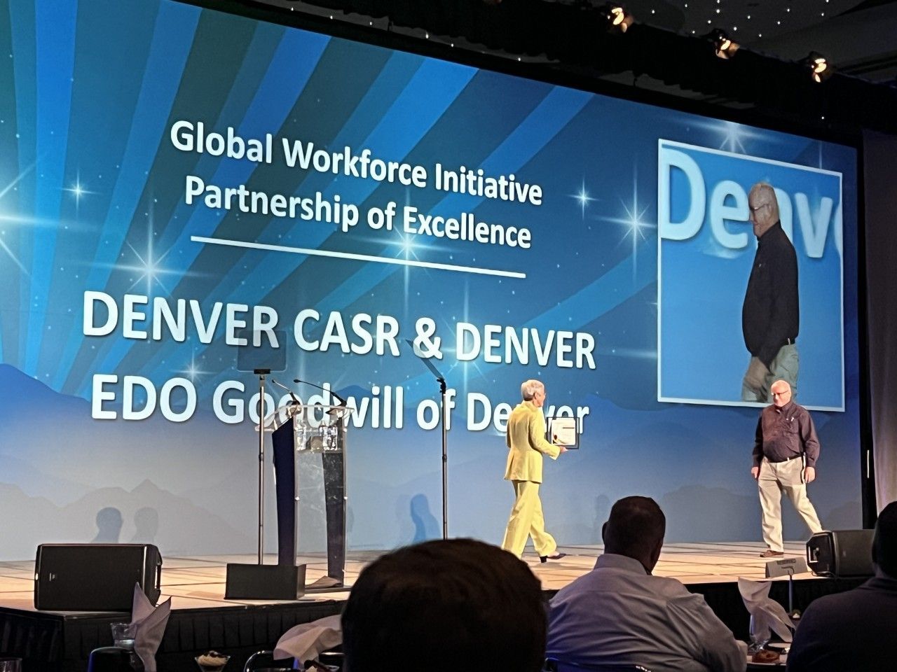 A stage with a screen displaying