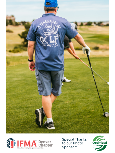 Man on golf course wearing blue shirt with