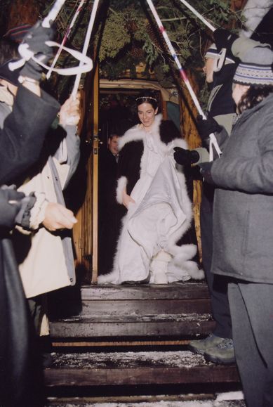 bride coming out of yurt