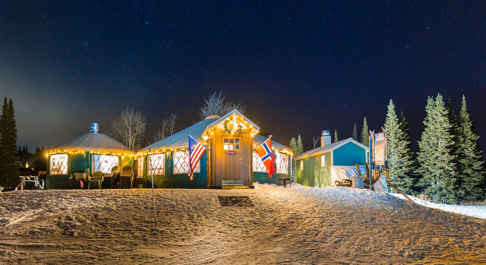 viking yurt at night with lights on