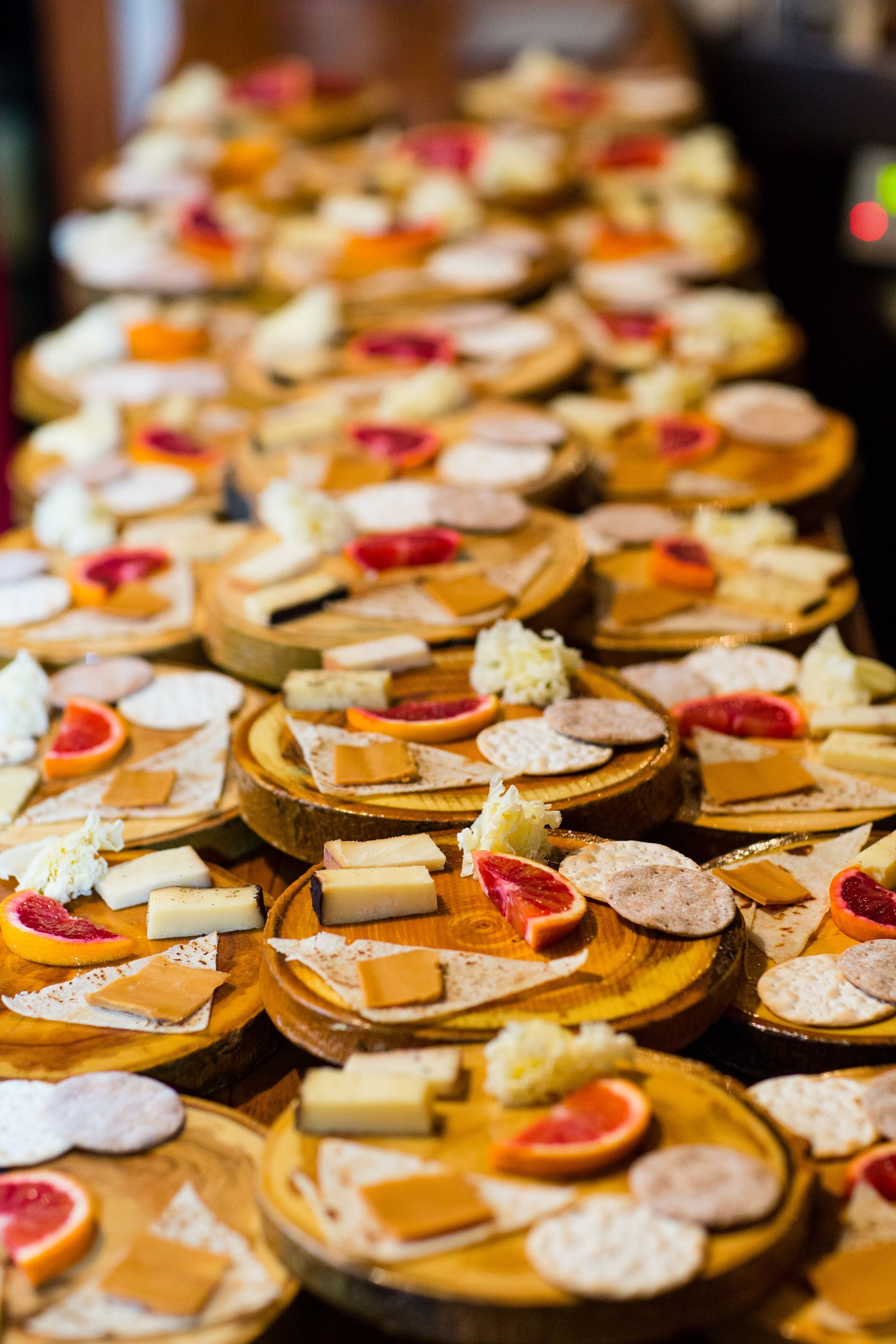 a table full of cheese platters
