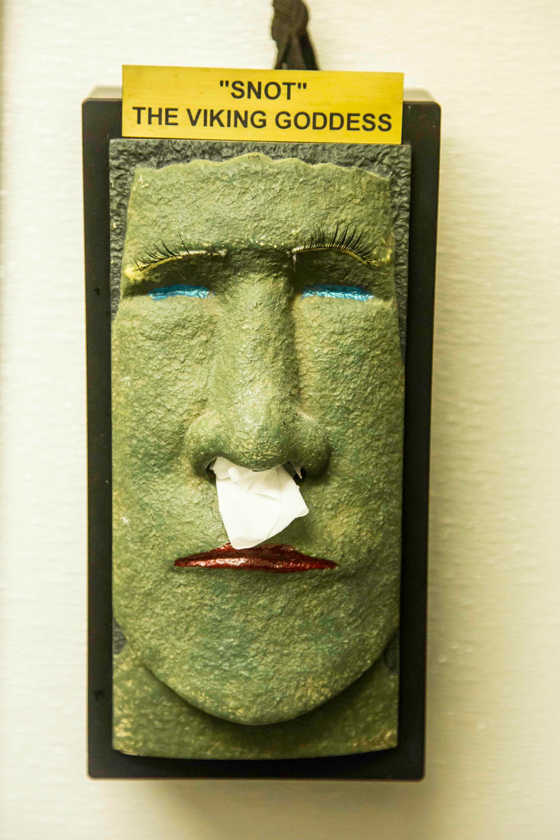 statue with tissue and lipstick