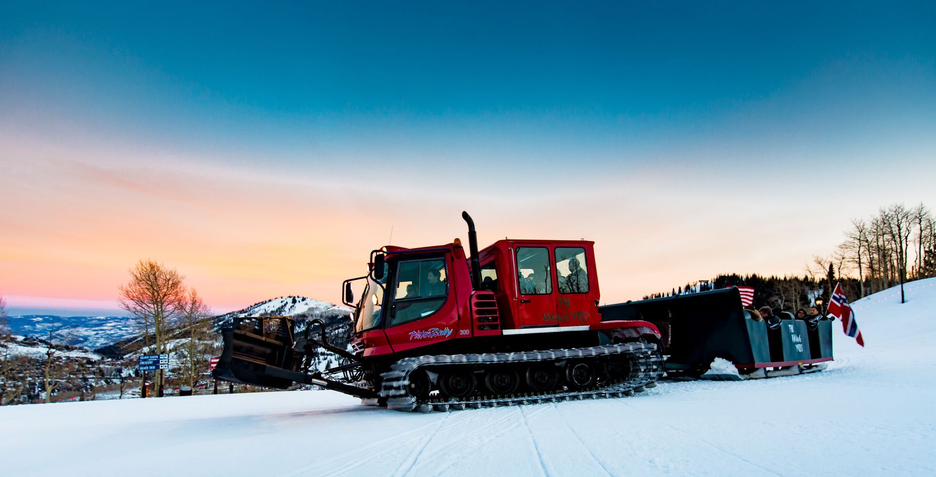 snow cat at sunset