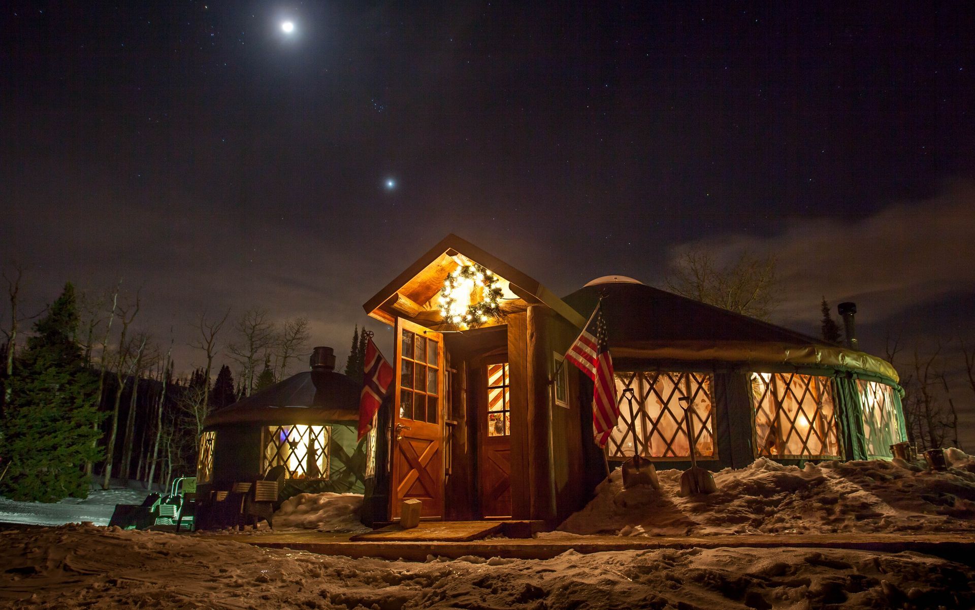 View of the Viking Yurt at night on snow covered slope