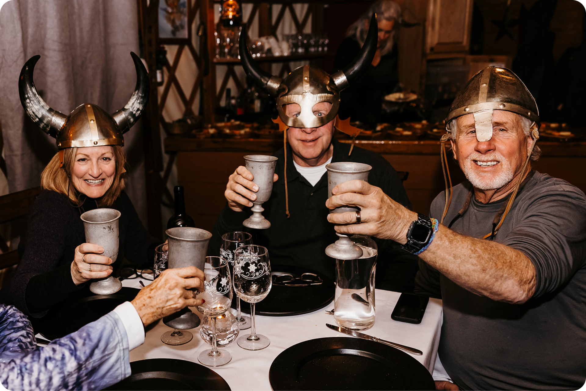 People with viking helmets on at the yurt