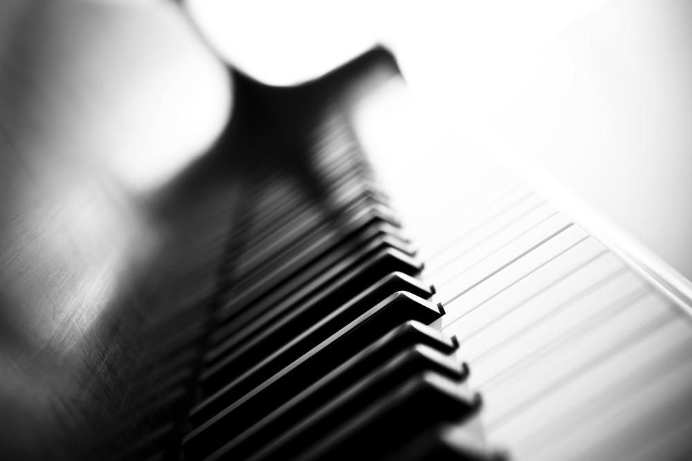 A Black and White Photo of A Piano Keyboard — David Simpson Pty Ltd in Redlynch, QLD