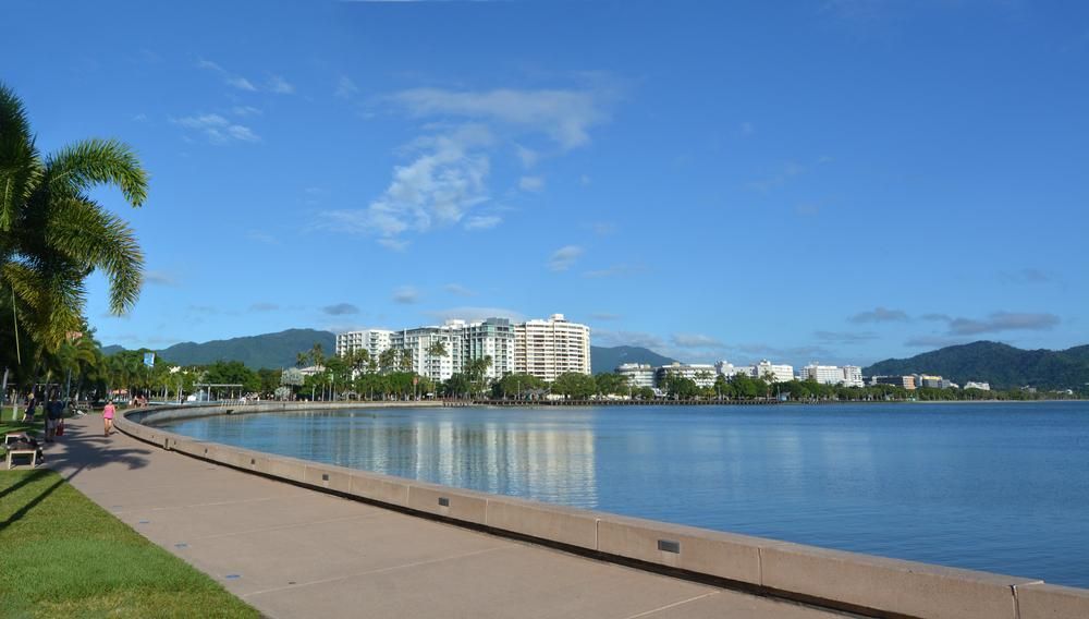 A Large Body of Water with A City in The Background — David Simpson Pty Ltd in Cairns, QLD
