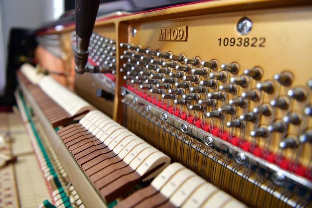 A Close up Of the Inside of An Upright Piano — David Simpson Pty Ltd in Redlynch, QLD