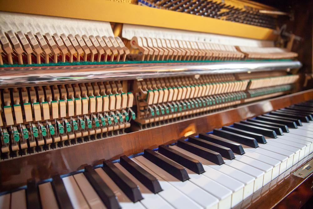A Close up Of the Inside of An Upright Piano — David Simpson Pty Ltd in Redlynch, QLD