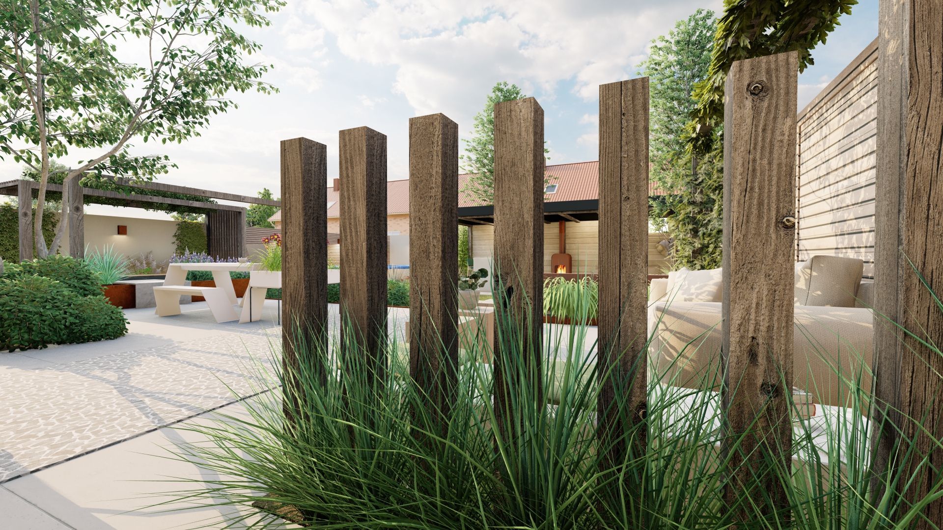 Een houten hek omgeven door hoog gras in een achtertuin.