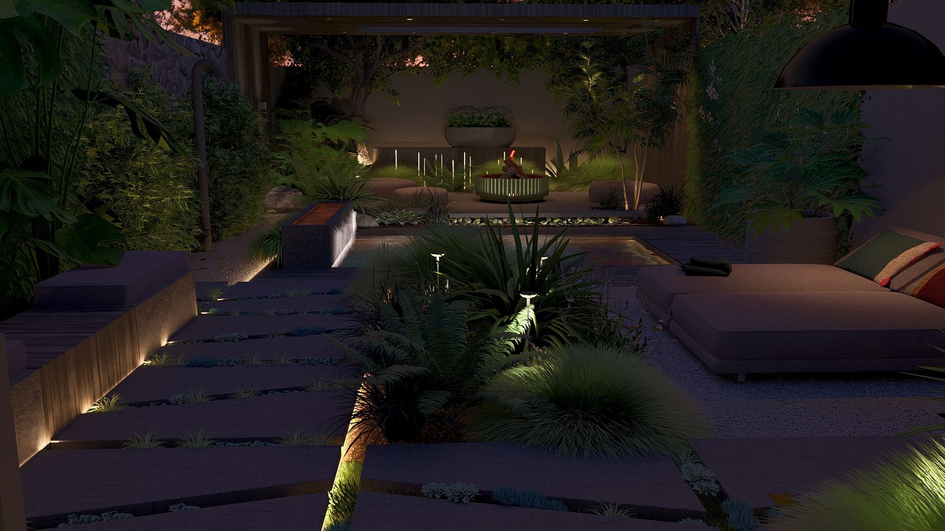 Een tuin bij zonsondergan met verlichting van In-lite tussen de beplanting. Betonnen tegels die een pad vormen naar achteren