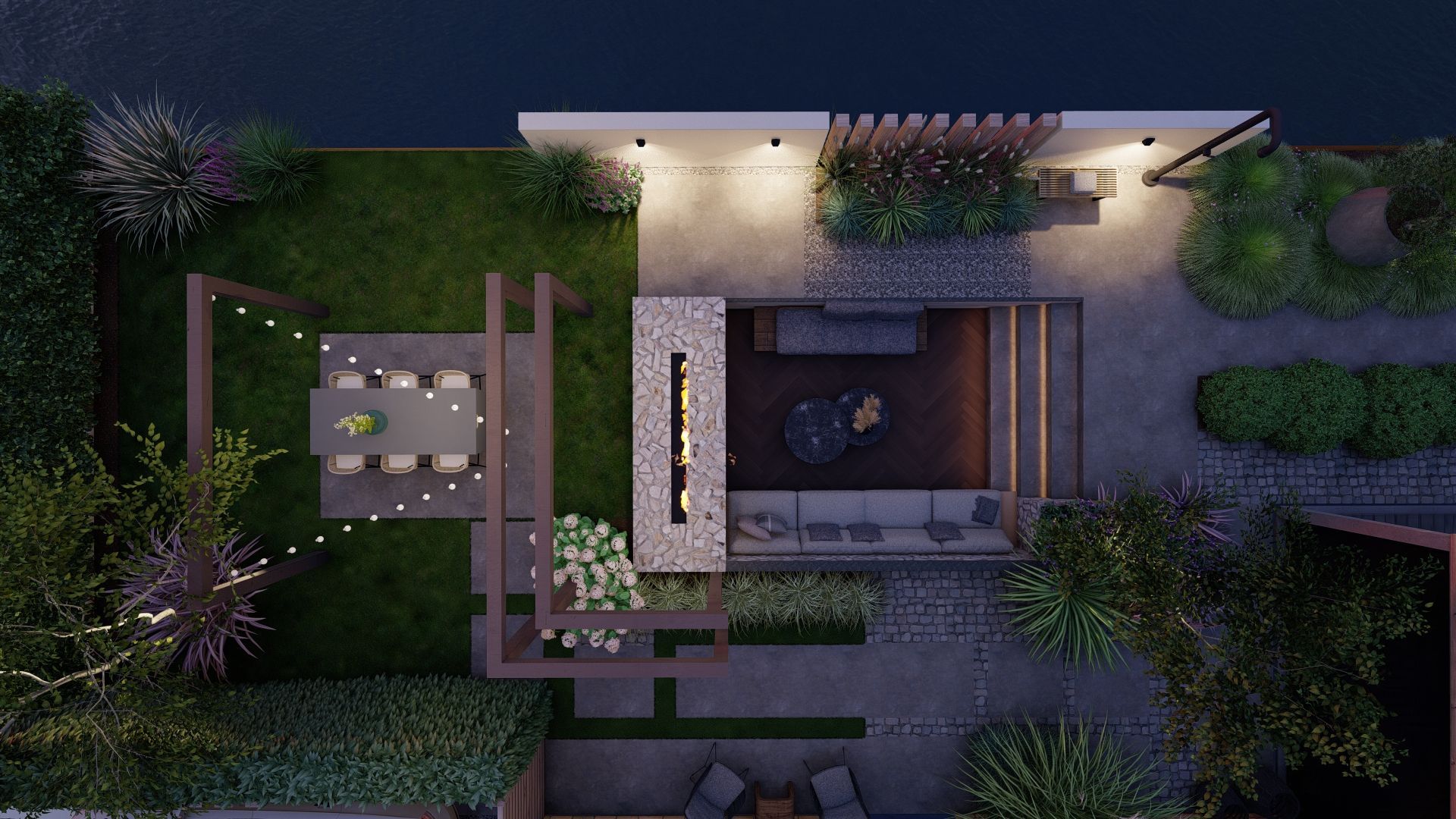 Een luchtfoto van een tuin bij nacht, met een tafel en stoelen.