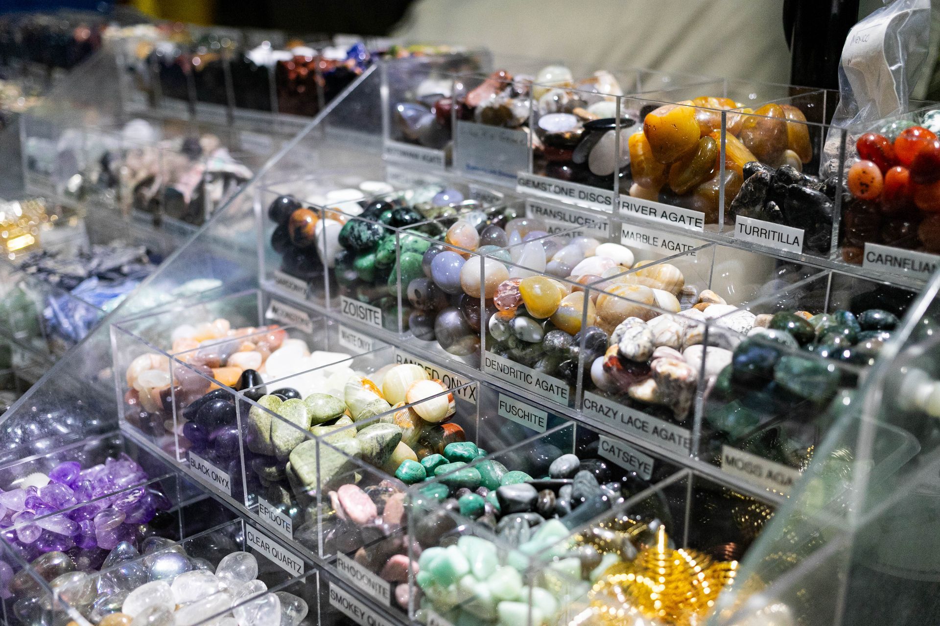 A group of people are standing around a table with a sign that says 3d on it