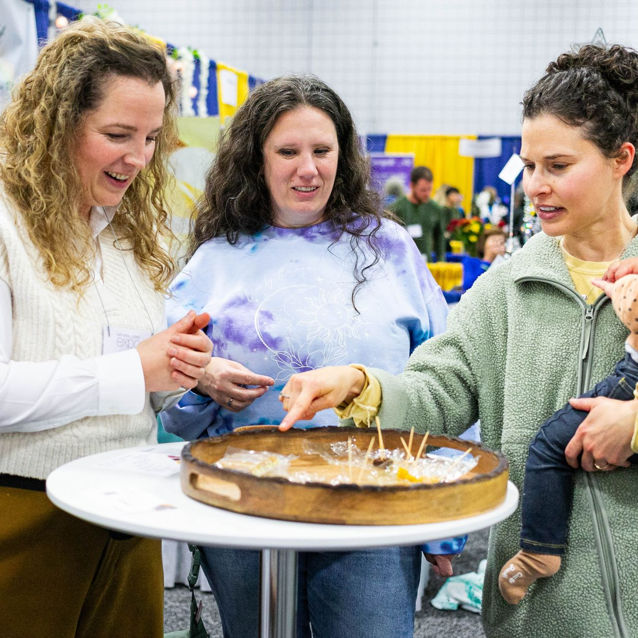 A man wearing a black shirt that says kale on it