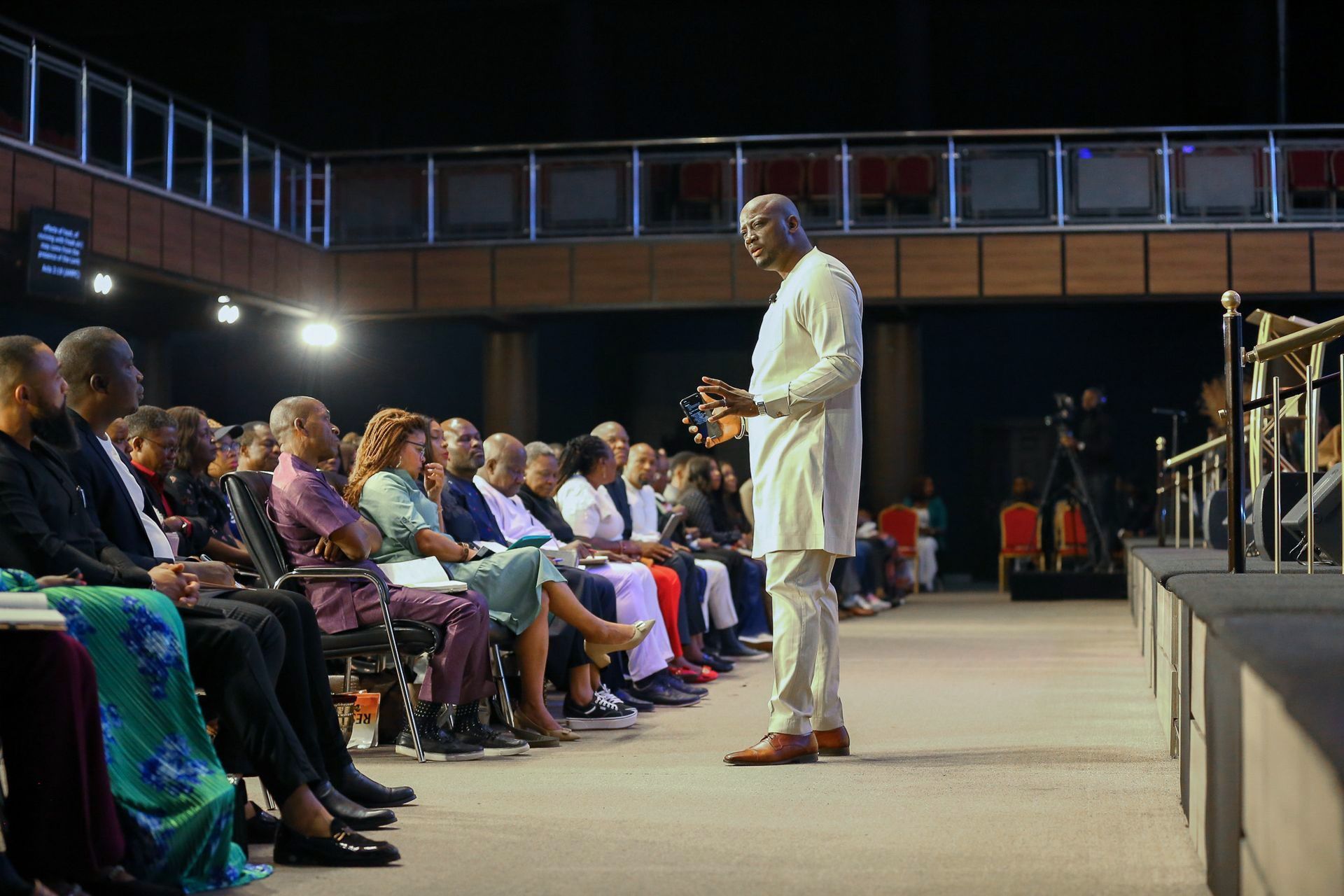 William Givens is standing preaching on foreign missions.