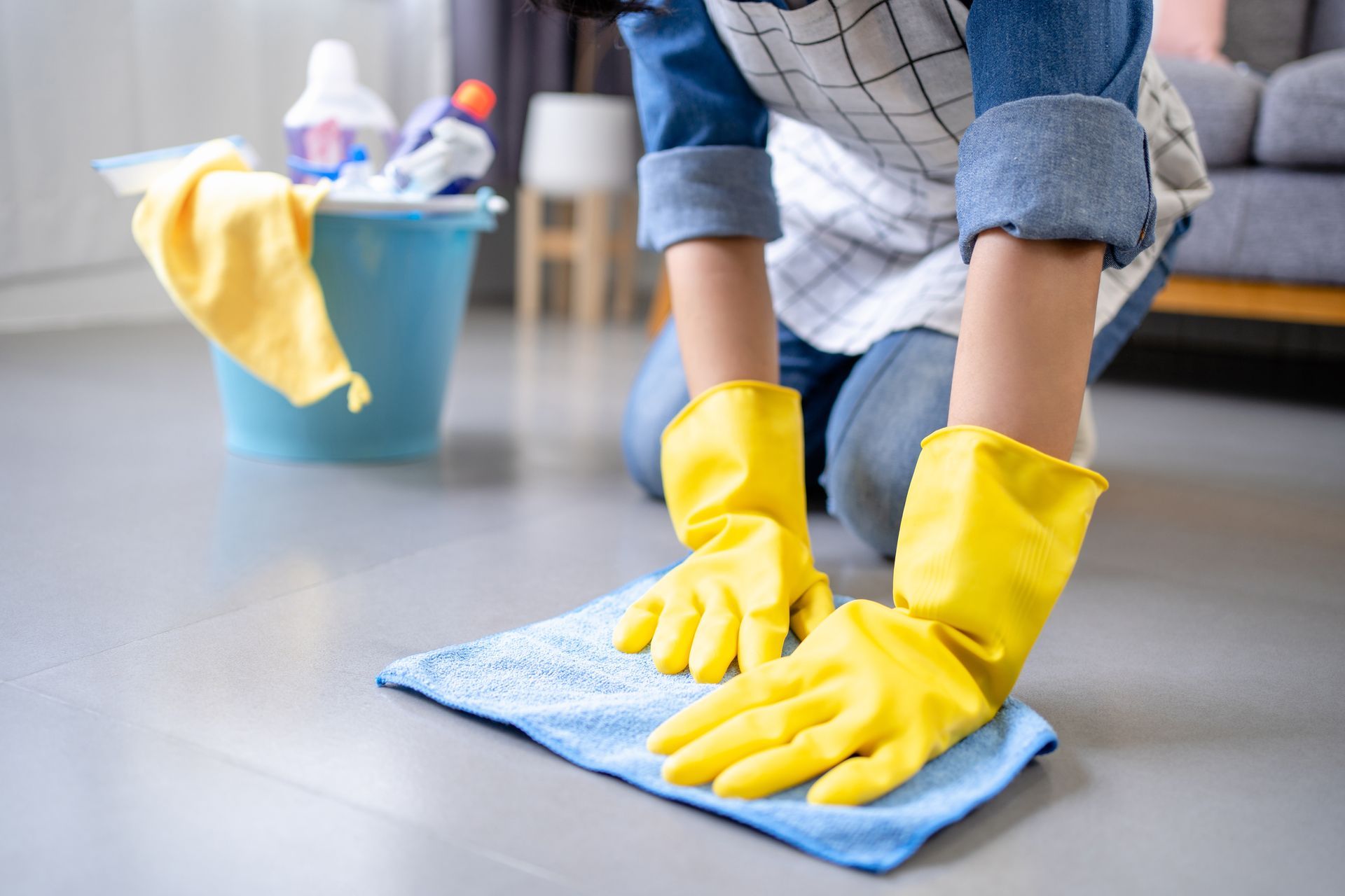 A woman cleaning the floor