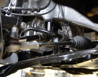 Car suspension system with a sway bar, ball joint, and tie rod | Mike's Automotive AC