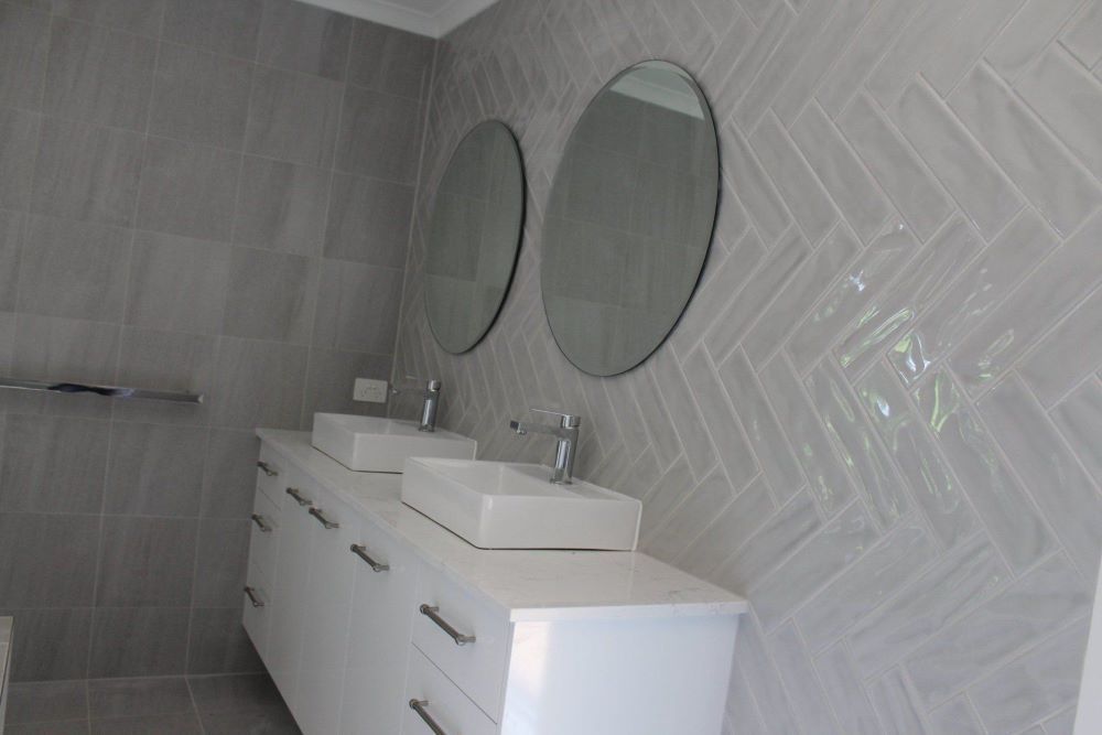 A Bathroom With Two Sinks and Two Mirrors — Jason Walsh Constructions in Alstonville, NSW