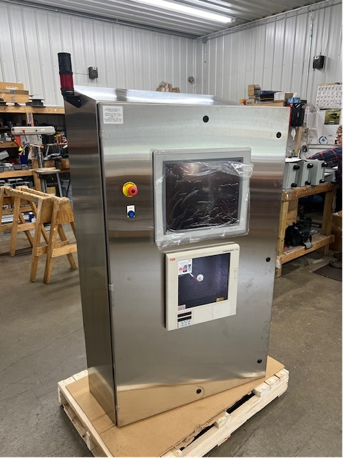 Stainless steel control panel with two display screens, red/blue buttons, and an indicator light.