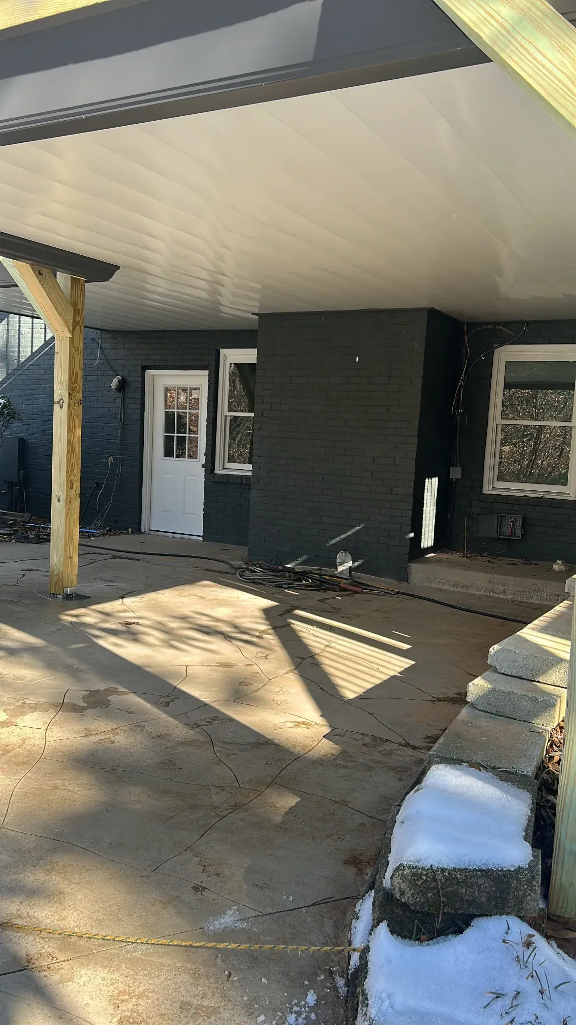 After installing white aluminum under deck ceiling panels.