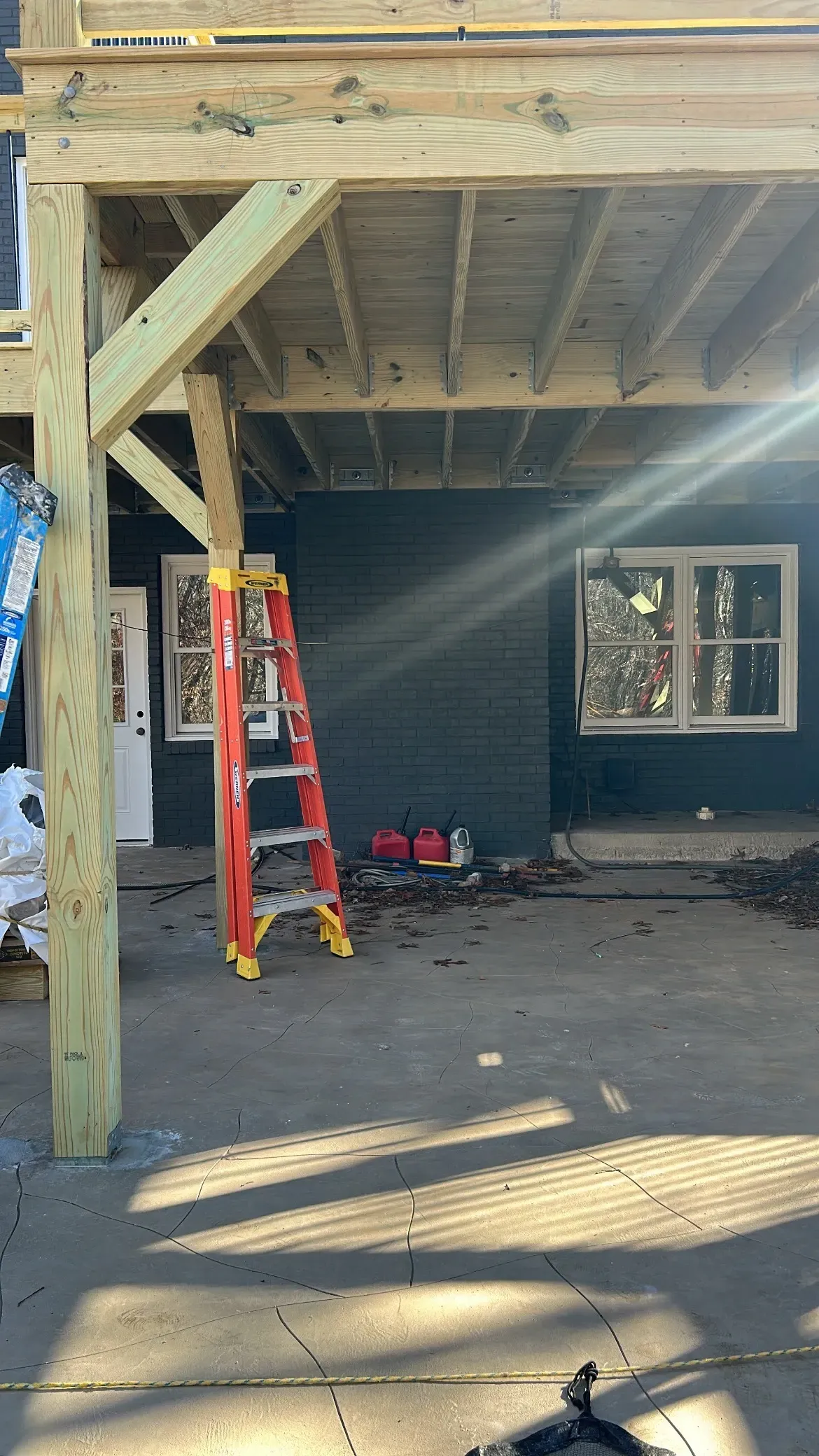 Before installing white aluminum under deck roof.