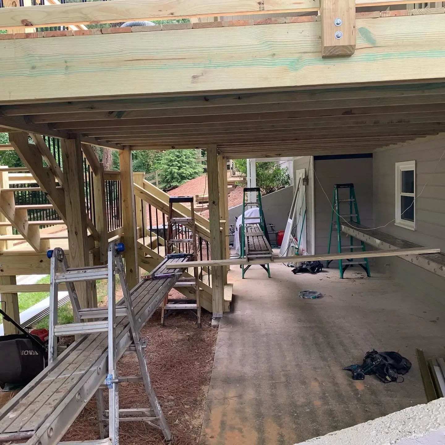 Before installing white colored aluminum under-deck ceiling with LED lighting and ceiling fans.