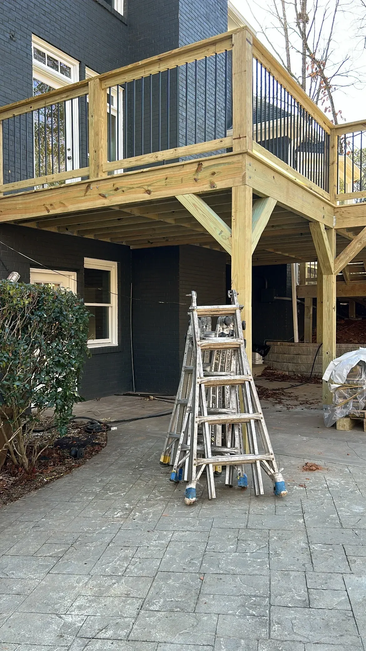 Before installing white under deck ceiling panels.