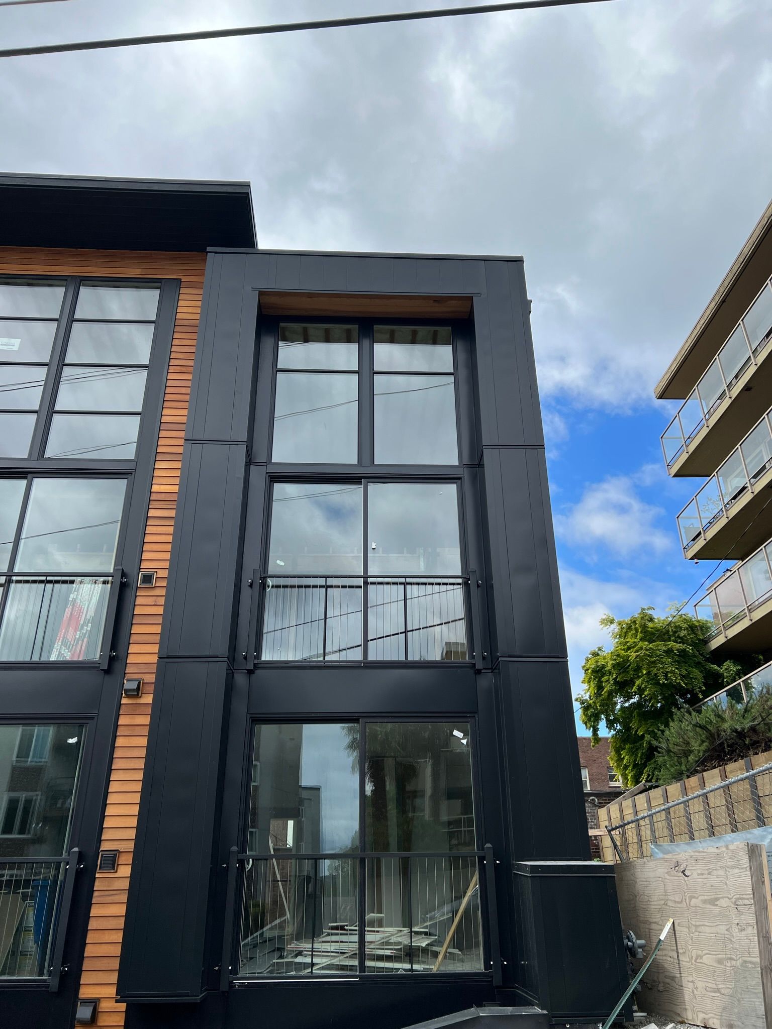 A building with a lot of windows is being built.