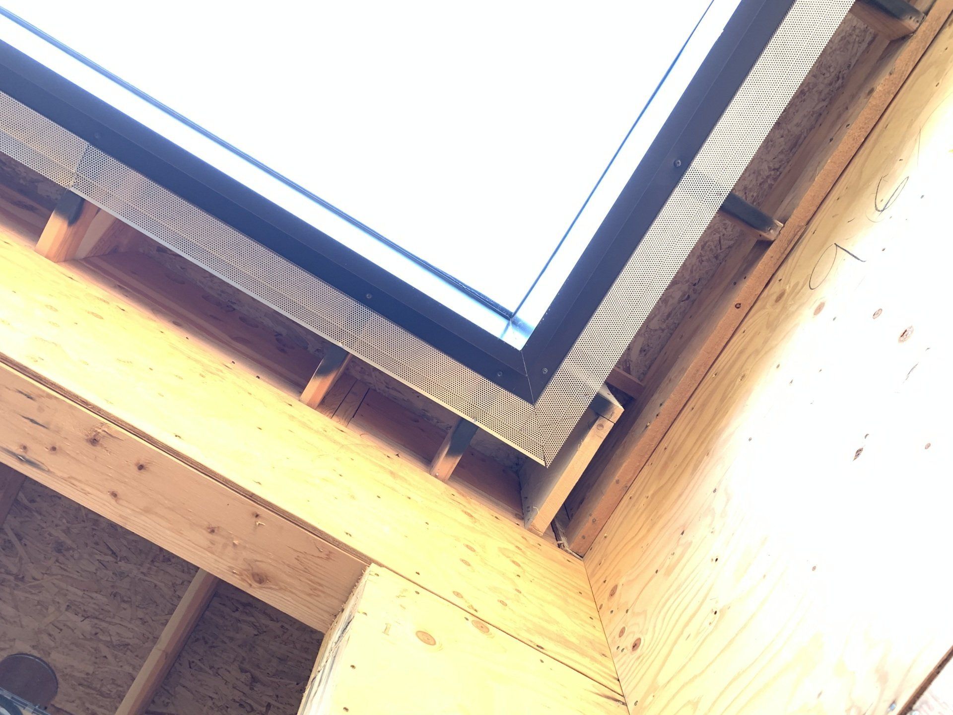 Looking up at the ceiling of a building under construction