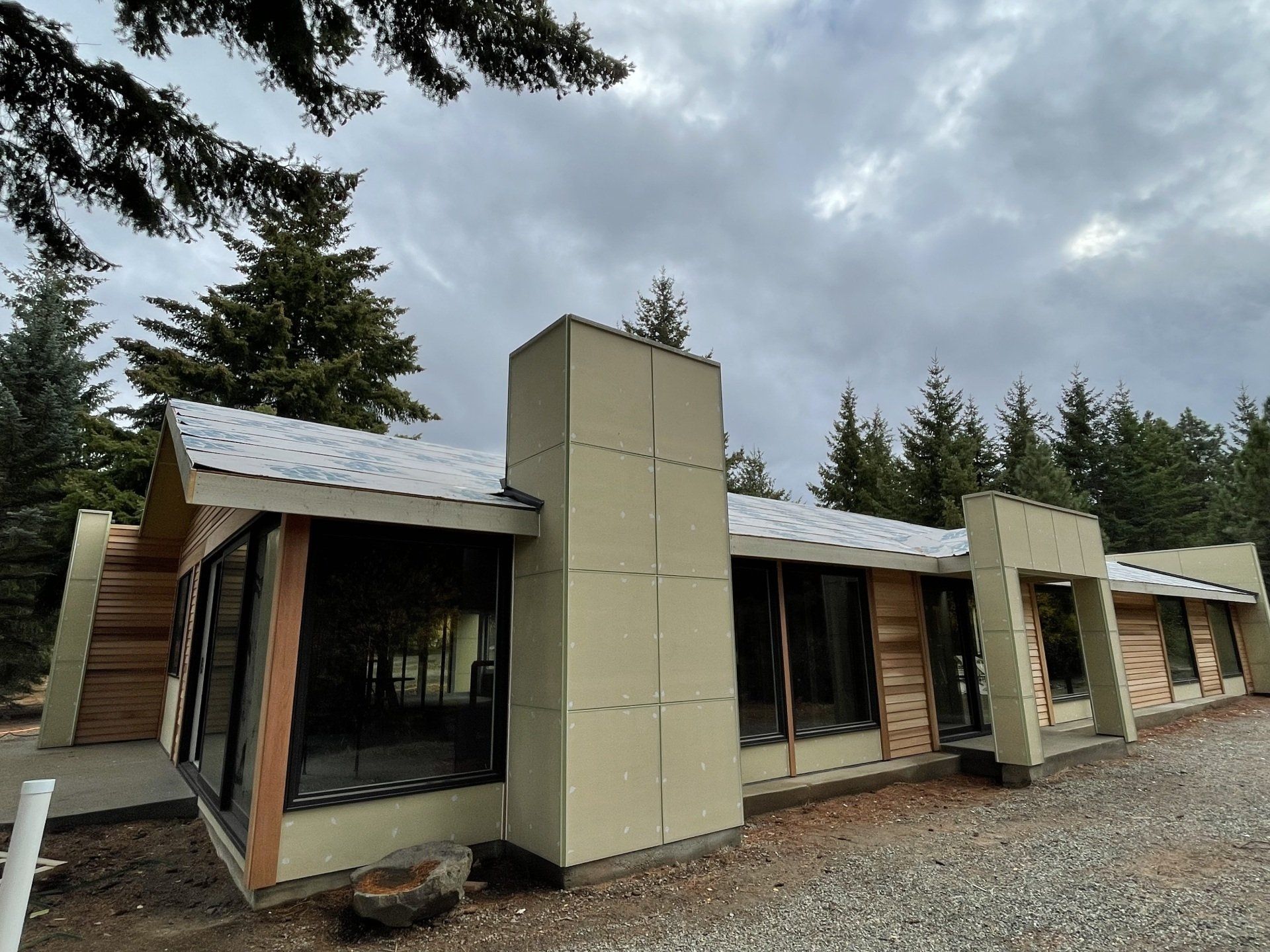 A house with a chimney on the side of it