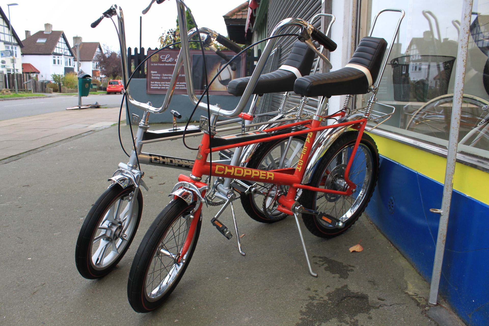 red and silver chopper bicycles