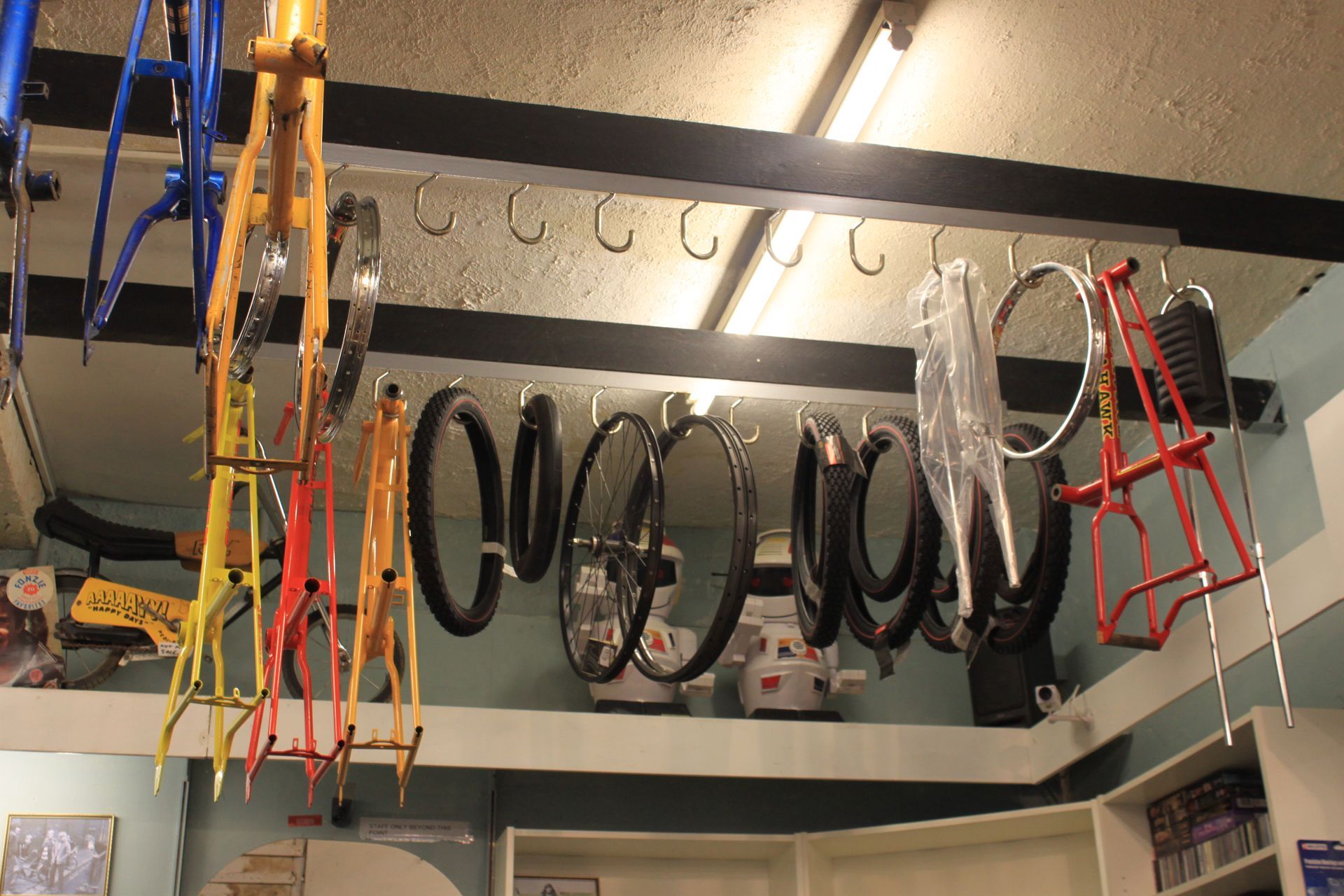 tyres and fames inside a bike shop