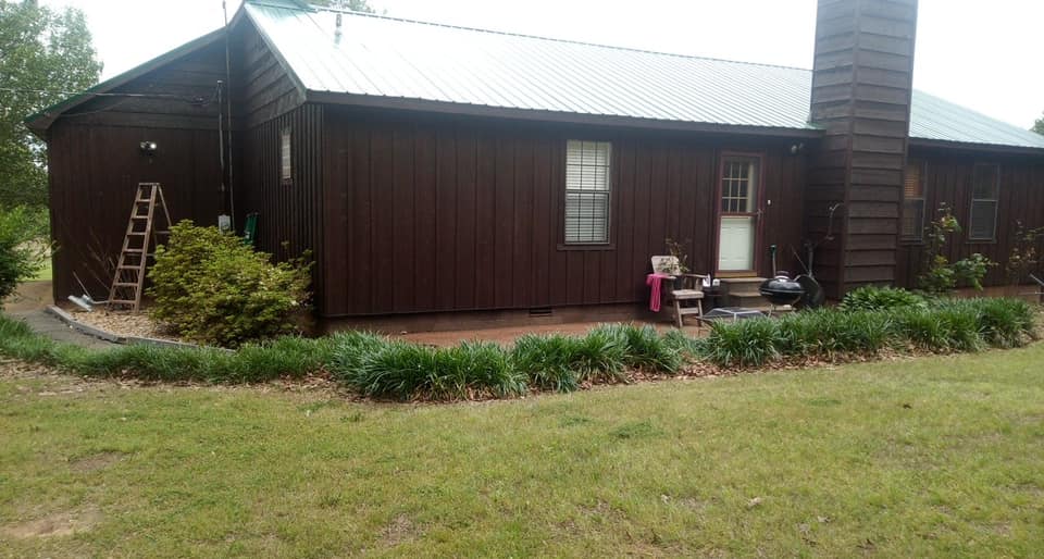 Metal Roof On Brown Building  — West TN — Mark’s Roofing Company