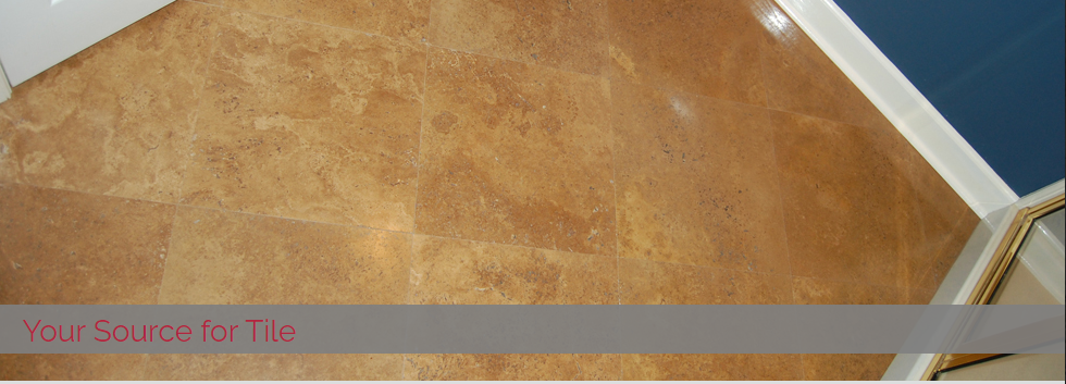 A picture of a floor with the words your source for tile on it