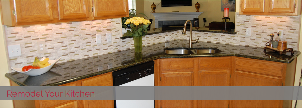 A kitchen with wooden cabinets and granite counter tops