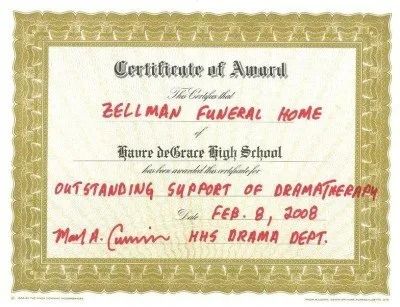 Certificate of award to Zellman Funeral Home from Havre deGrace High School for outstanding support of dramatherapy. Signed and dated.