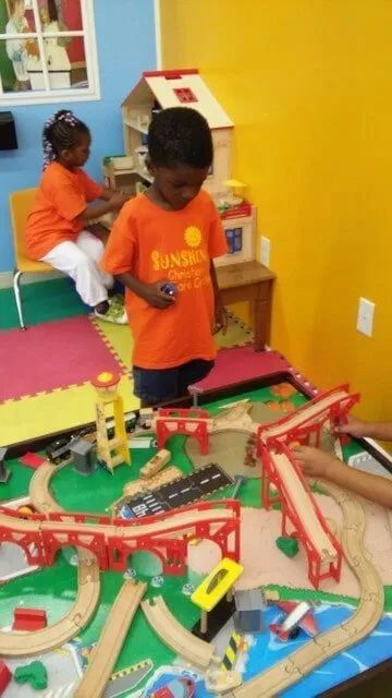 Kids Playing Train Toy — York, PA — Sunshine Christian Daycare / Learning Center