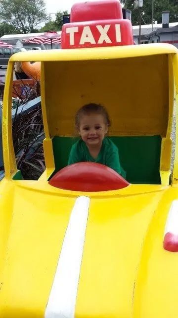 Girl In Toy Car — York, PA — Sunshine Christian Daycare / Learning Center
