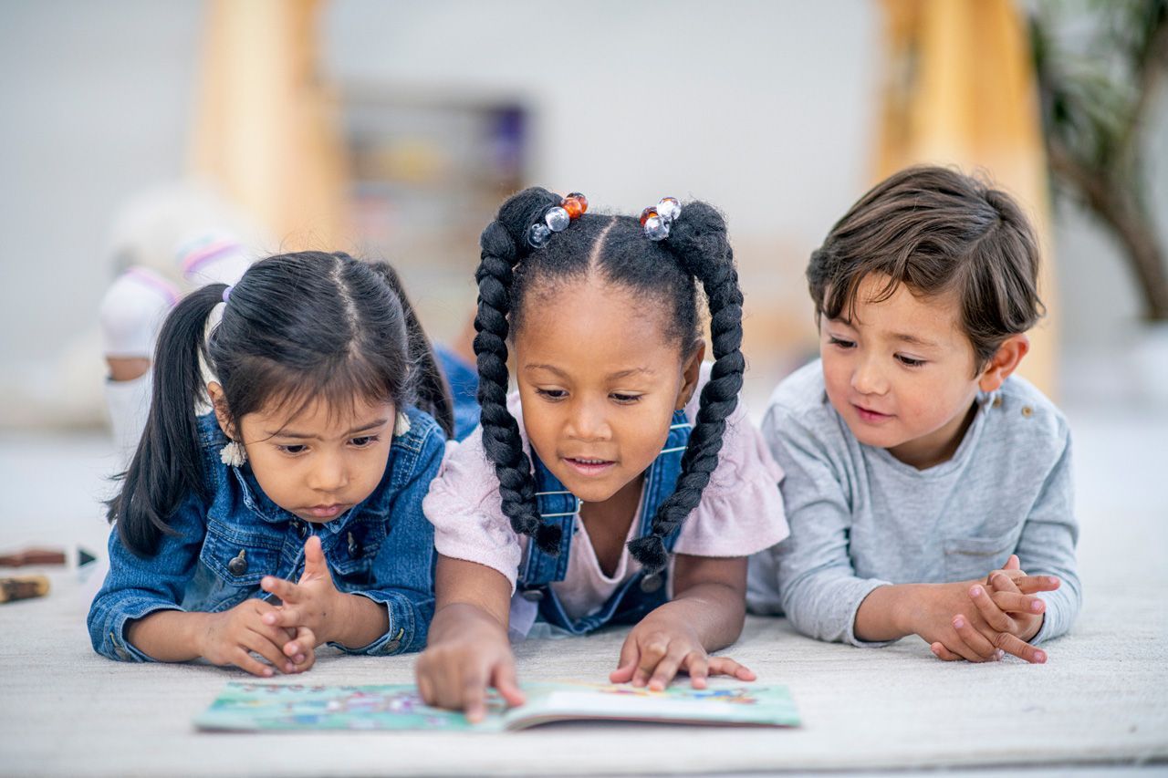 Kids Reading A Book — York, PA — Sunshine Christian Daycare / Learning Center