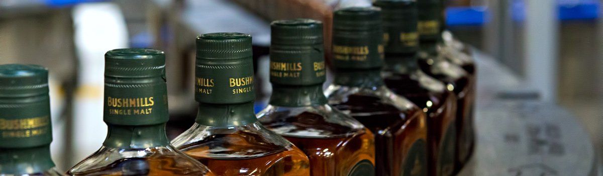 Photo - Bushmills Whiskey Bottles by Art Ward